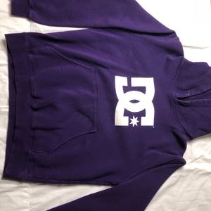 a big purple hoodie.
